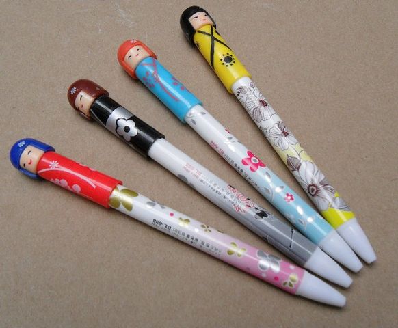Plumas de kokeshi